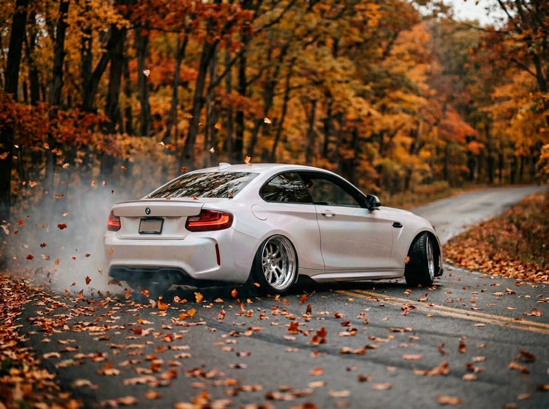 White-with-black-roof BMW F87 M2 mid-drift, Esse Werks calibration